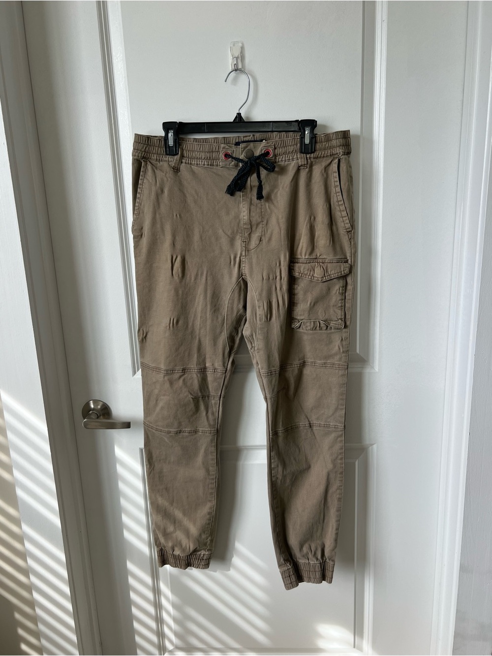 Modern Amusement Men's Cargo Pants in Khaki with Black Drawstring